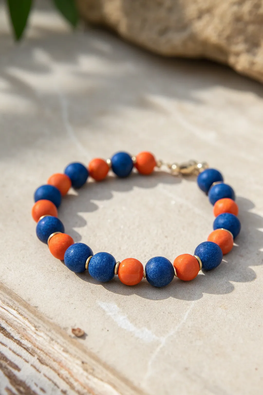 Complementary clay bead bracelet with a bold color rhythm, minimal styling and natural texture.