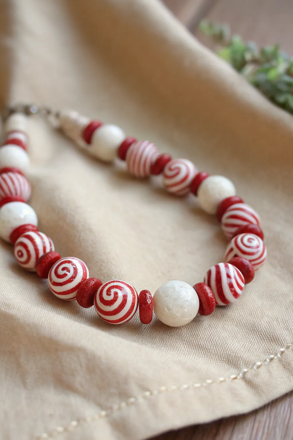 Peppermint swirl statement beads turn a simple bracelet into a festive handmade holiday accent.