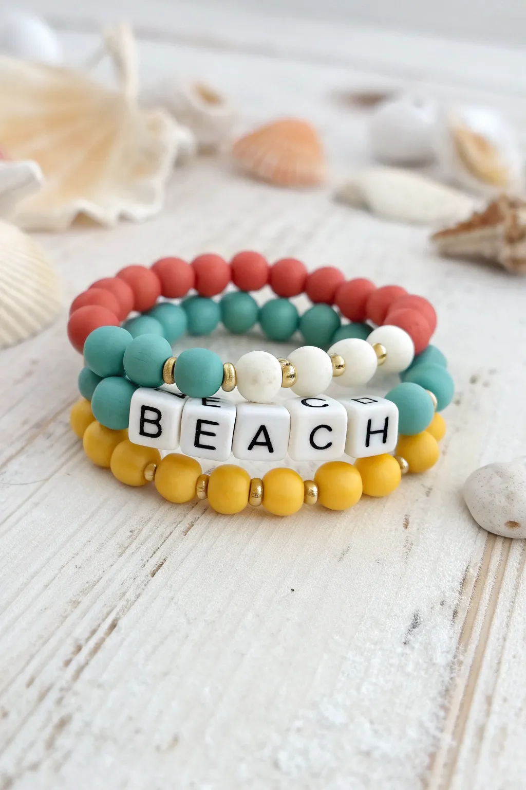 Custom summer stack with bold clay beads and BEACH letters for an airy Scandinavian boho vibe