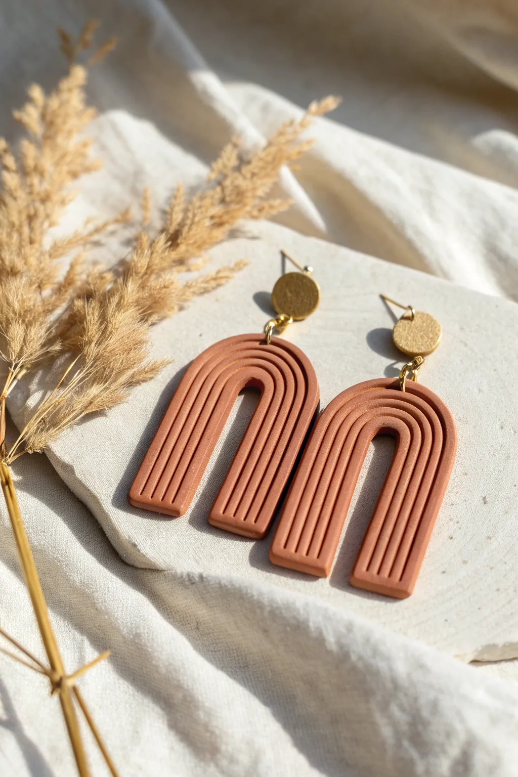 Ribbed clay arches with crisp grooves and warm matte tones for a clean, bold statement.
