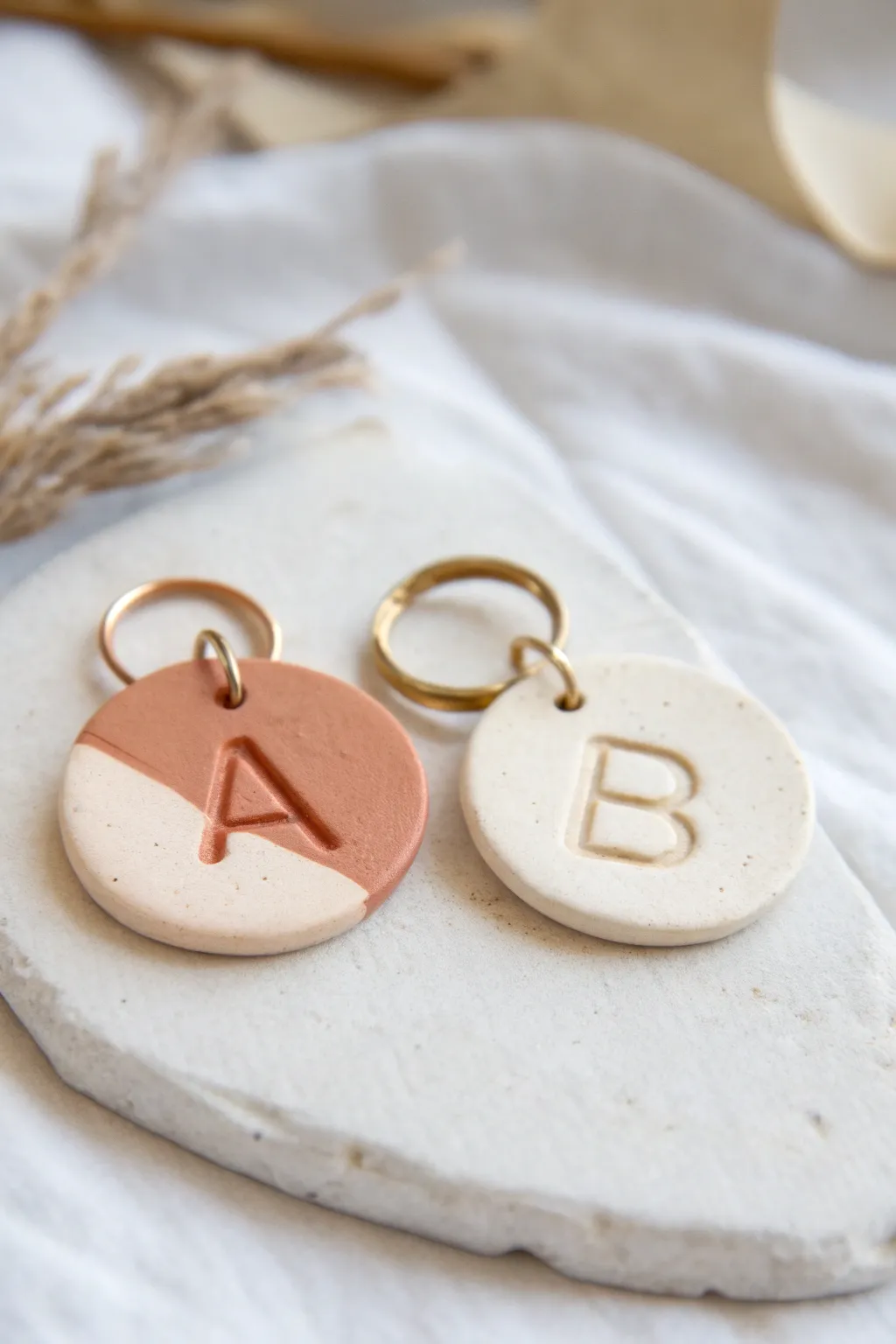 Couples clay challenge: matching color-block keychain tags with bold carved initials