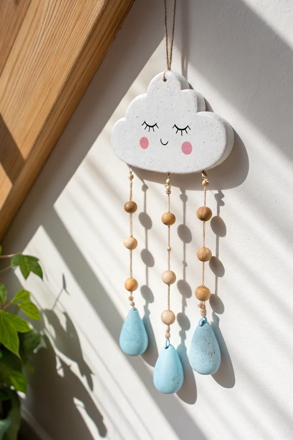 Sweet air dry clay cloud with dangling raindrops, a minimalist boho wall charm for beginners