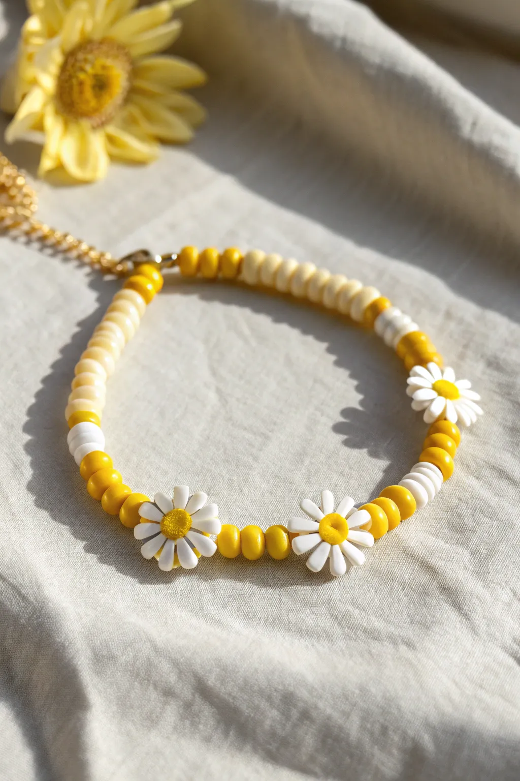 Sunny yellow and white clay heishi bracelet with daisy spacers, simple, happy, handmade charm.
