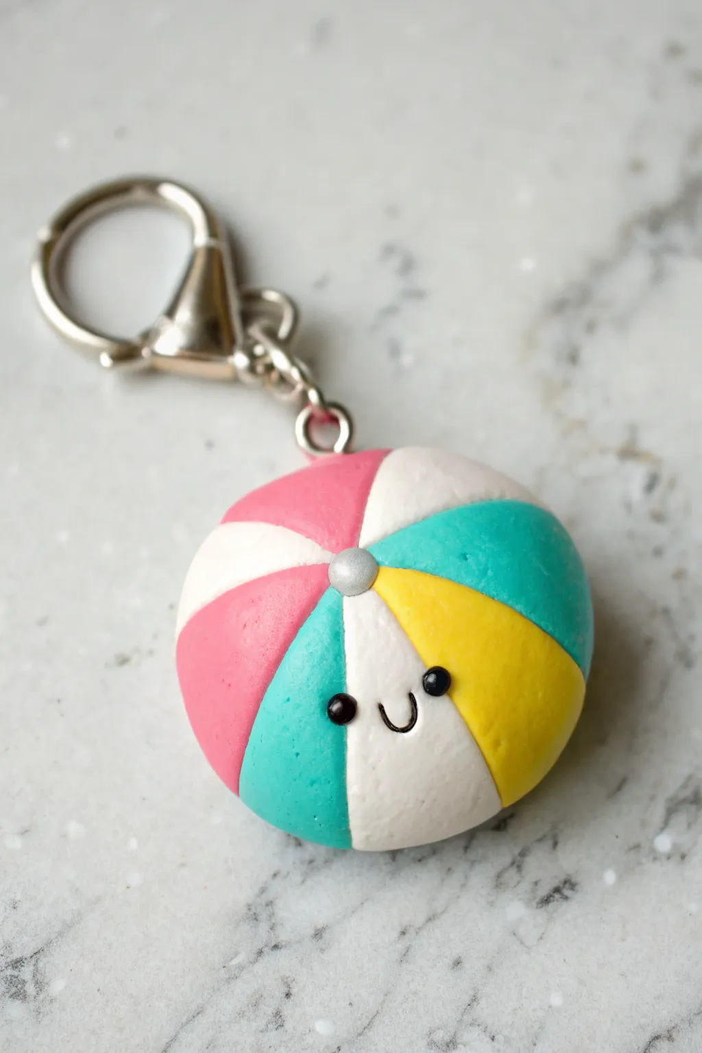 Tiny beach ball charm with a sweet smile, the cutest summer clay keychain for sunny days.