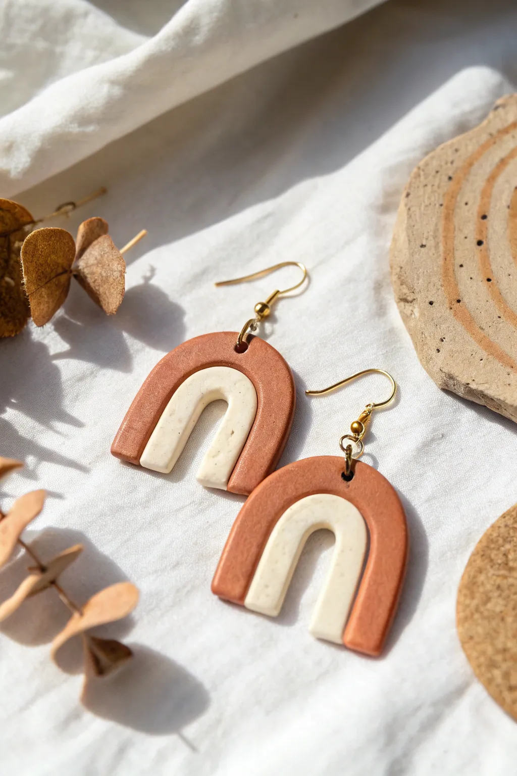 Minimalist DIY clay dangle earrings with clean arches, matte neutrals, and a soft boho feel