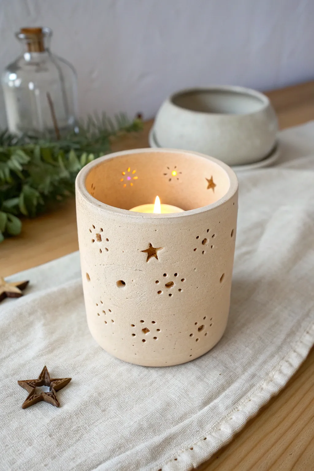Soft-glow air dry clay tea light holder with simple cutouts, minimalist and cozy.