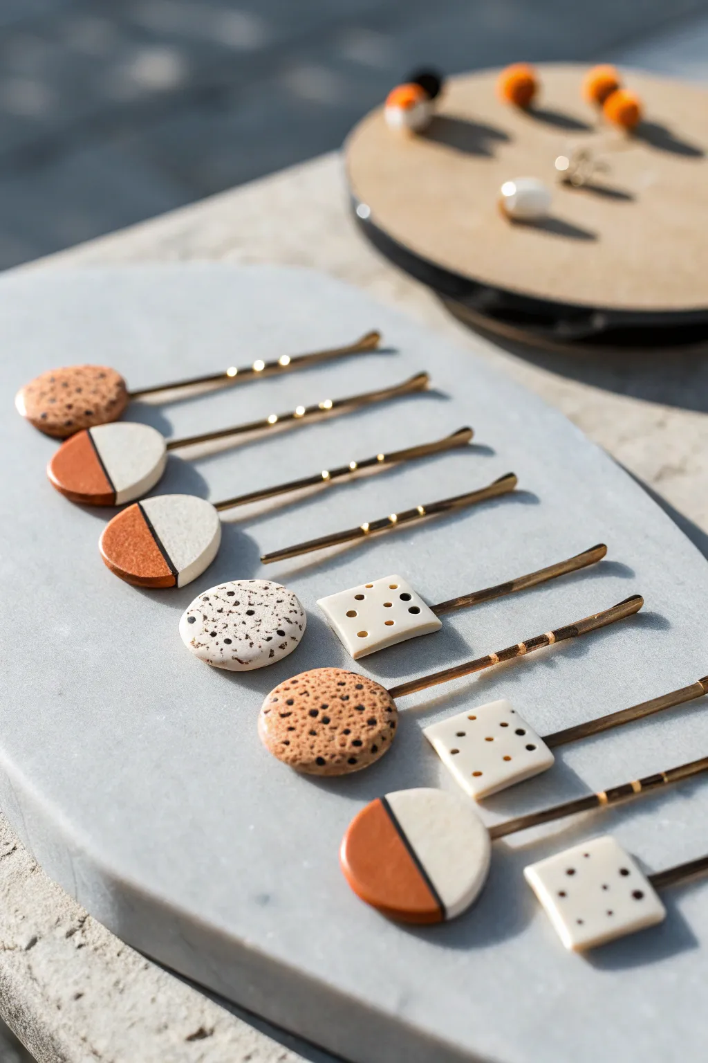Minimal oven-bake clay hair clips with tiny abstract shapes, styled in calm Scandinavian tones.