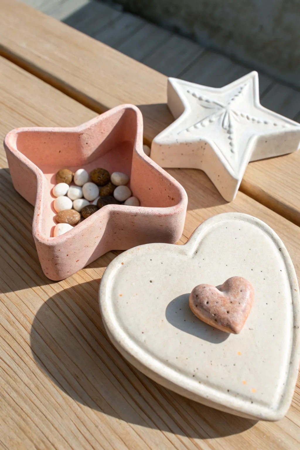 Sweet oven-bake clay treasure boxes: a tiny star and heart duo for kids mini keepsakes.