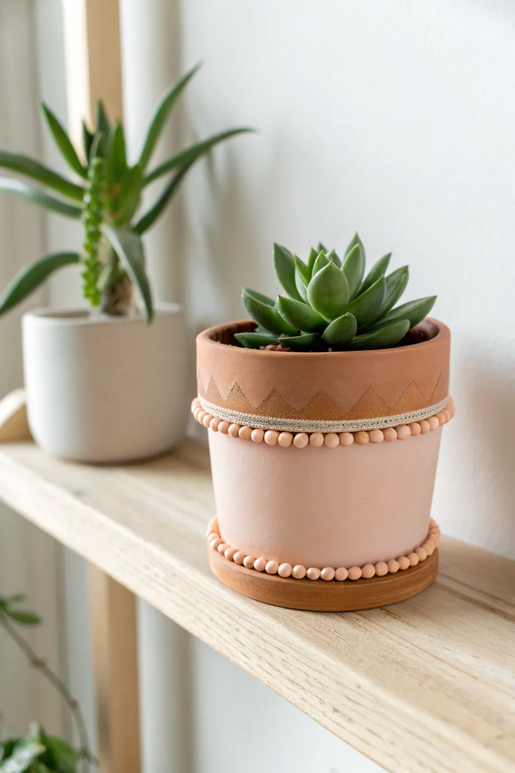Sweet polymer clay charm band adds a playful scalloped rim to a minimalist succulent planter.