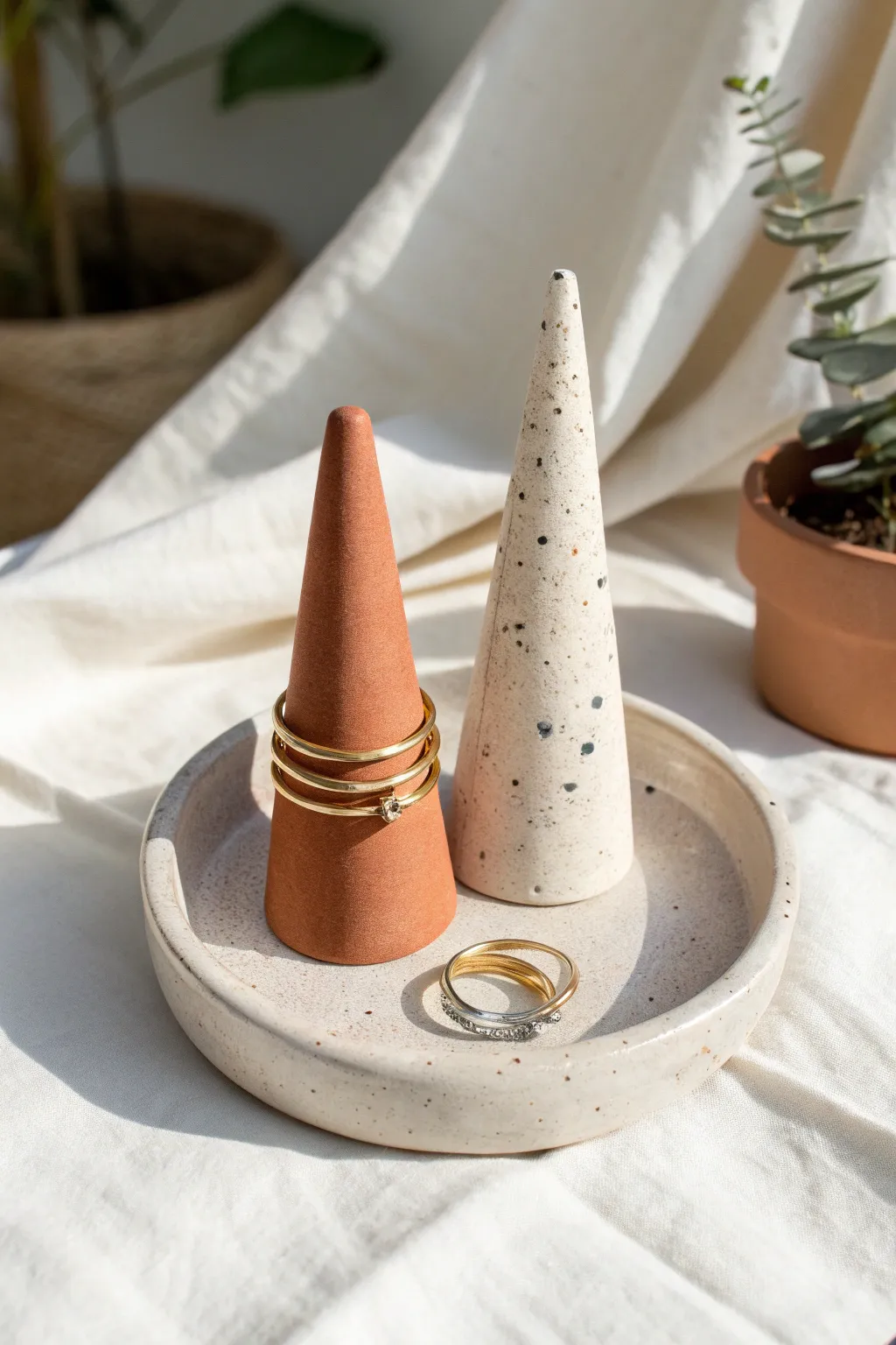 Minimal polymer clay ring cones on a tray, styled to gift well with a soft boho touch