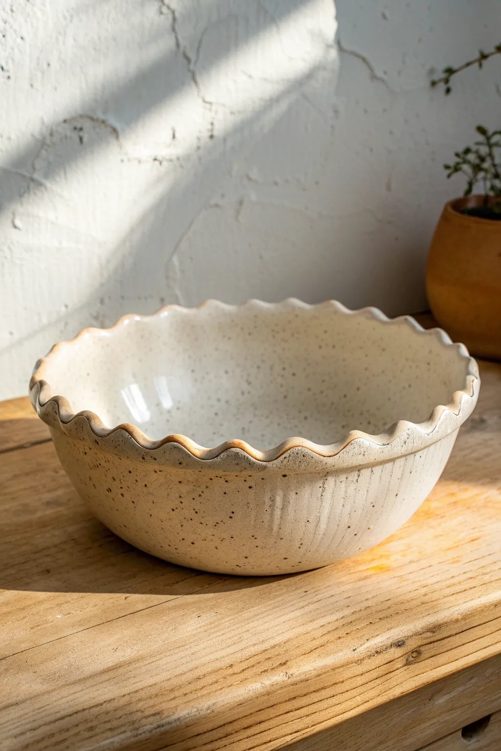 Soft wave scalloped rim slab bowl in warm clay tones, calm minimalist styling for boho homes.